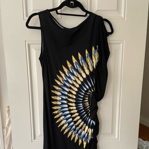 BCBGMaxazria dress with feather graphic. Ruffle down one side.